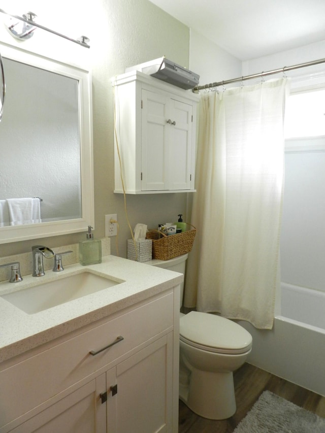 2865 Carrie Ln, Saint Joseph, MI 49085 - full bath featuring vanity, shower / tub combo with curtain, and wood finished floors