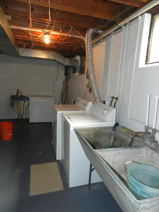 2865 Carrie Ln, Saint Joseph, MI 49085 - basement with washer and clothes dryer and concrete block wall