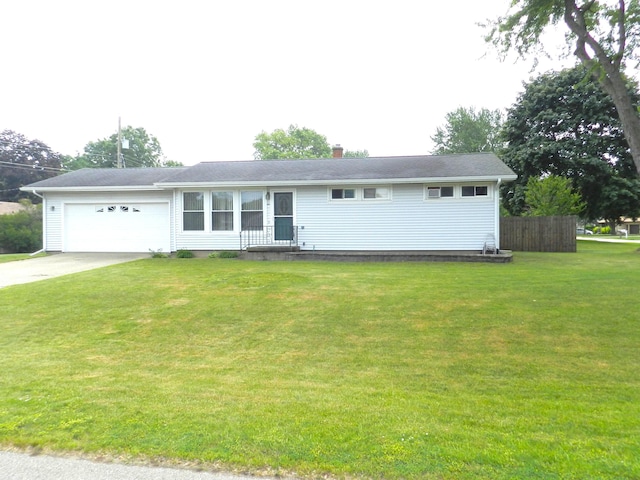 2865 Carrie Ln, Saint Joseph, MI 49085 - ranch-style house featuring a garage, concrete driveway, and a chimney