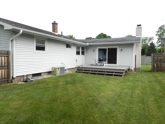 2865 Carrie Ln, Saint Joseph, MI 49085 - rear view of house featuring a chimney and a deck