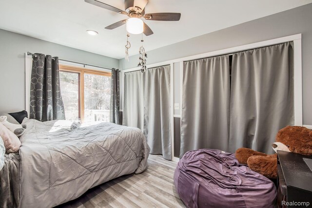 12109 Shaffer Rd, Davisburg, MI 48350 - bedroom featuring light wood-style flooring, ceiling fan, and recessed lighting