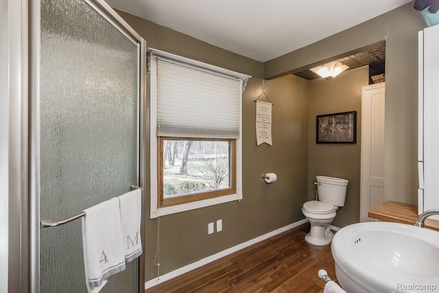 12109 Shaffer Rd, Davisburg, MI 48350 - bathroom with wood finished floors and a shower with shower door