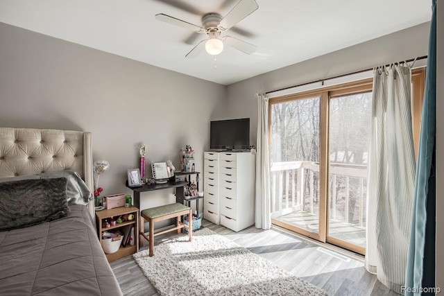 12109 Shaffer Rd, Davisburg, MI 48350 - bedroom with access to outside, light wood-style floors, and ceiling fan