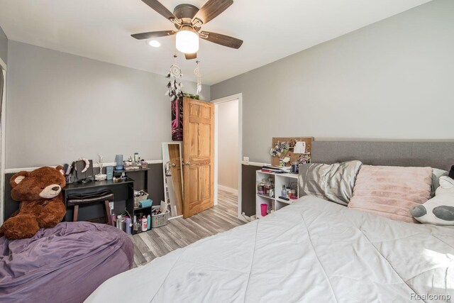 12109 Shaffer Rd, Davisburg, MI 48350 - bedroom with light wood-type flooring and a ceiling fan