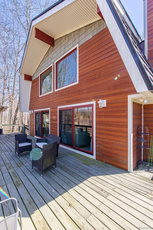 12109 Shaffer Rd, Davisburg, MI 48350 - deck with an outdoor living space