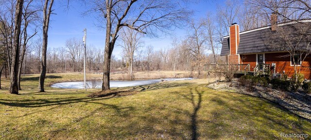 12109 Shaffer Rd, Davisburg, MI 48350 - view of green lawn with a water view