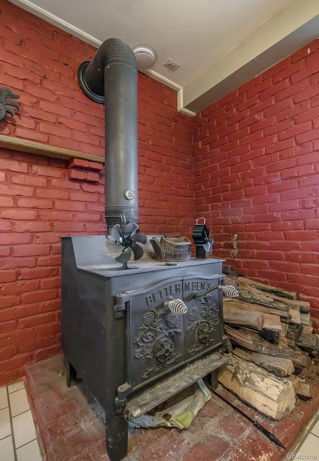 12109 Shaffer Rd, Davisburg, MI 48350 - detailed view of a wood stove and brick wall