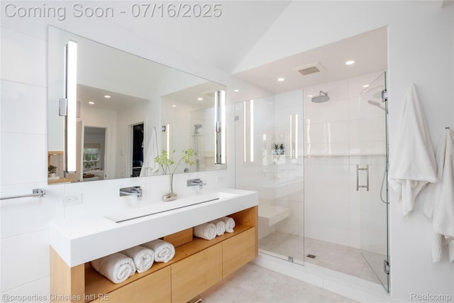 22080 Chase Dr, Novi, MI 48375 - bathroom featuring a stall shower, vanity, recessed lighting, and vaulted ceiling