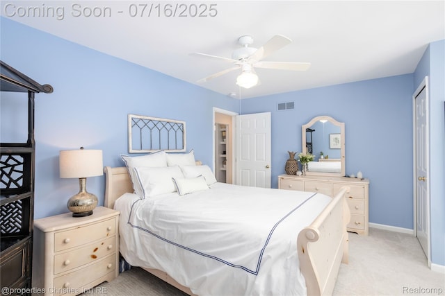 22080 Chase Dr, Novi, MI 48375 - bedroom with light carpet, ceiling fan, and a closet