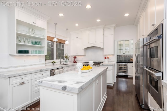 22080 Chase Dr, Novi, MI 48375 - kitchen featuring appliances with stainless steel finishes, white cabinetry, decorative backsplash, and recessed lighting