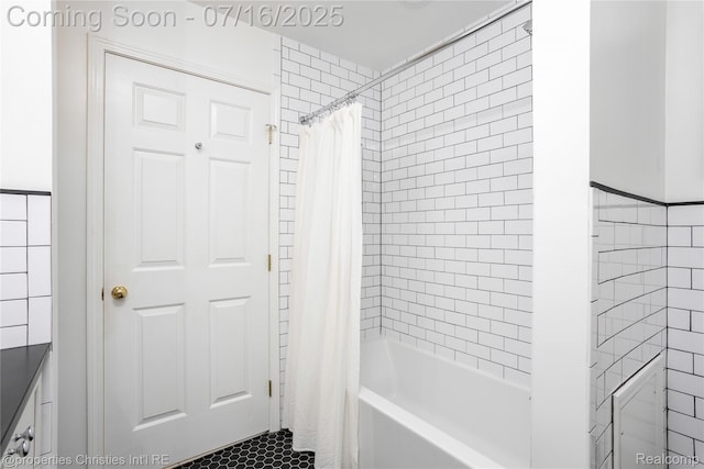 22080 Chase Dr, Novi, MI 48375 - full bath with shower / tub combo with curtain, tile patterned flooring, and tile walls