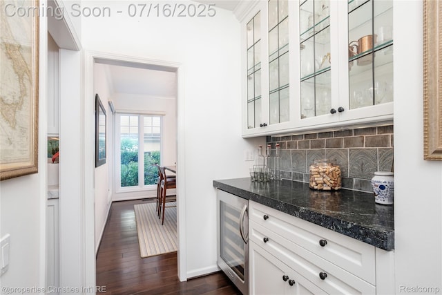 22080 Chase Dr, Novi, MI 48375 - indoor dry bar featuring beverage cooler, dark wood-style flooring, and backsplash