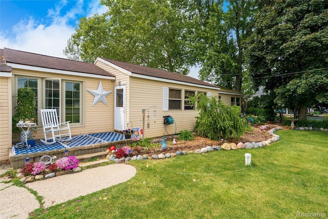 5045 Baldwin Rd, Swartz Creek, MI 48473 - view of front of house with a front lawn