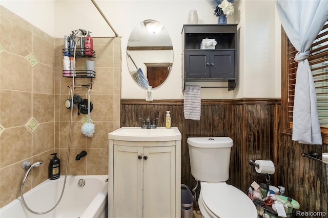 5045 Baldwin Rd, Swartz Creek, MI 48473 - full bathroom featuring wainscoting, vanity, and tub / shower combination