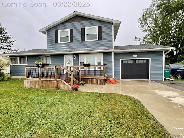 7094 Reid Rd, Swartz Creek, MI 48473 - view of front facade featuring an attached garage, concrete driveway, a front lawn, and a deck