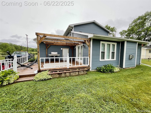 7094 Reid Rd, Swartz Creek, MI 48473 - back of house with a wooden deck and a yard