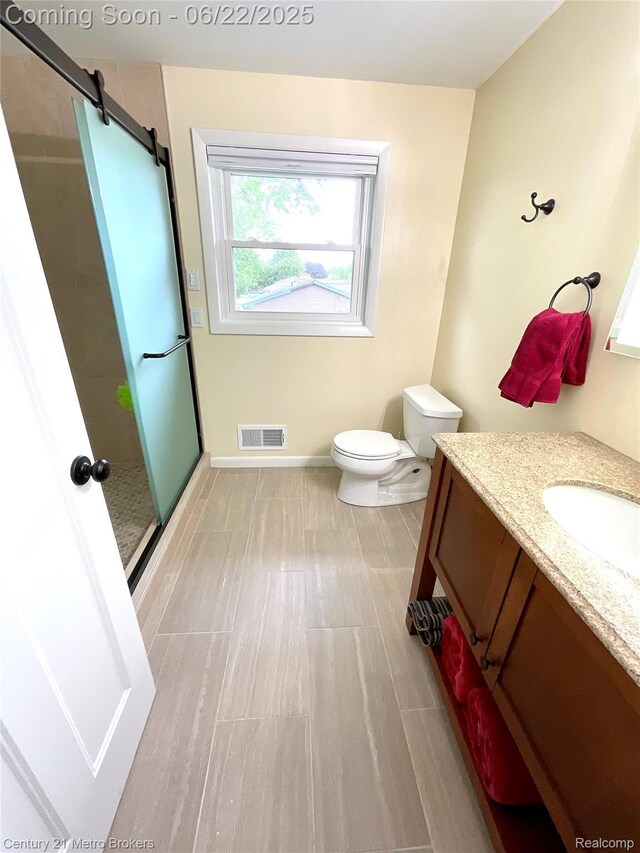 7094 Reid Rd, Swartz Creek, MI 48473 - bathroom with vanity and a stall shower