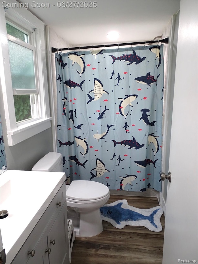11306 W St, Grand Blanc, MI 48439 - full bathroom with vanity, wood finished floors, and curtained shower