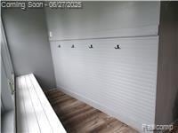 11306 W St, Grand Blanc, MI 48439 - mudroom with wood finished floors and baseboards