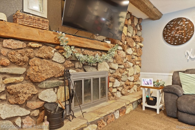 605 Shawnesee, Flushing, MI 48433 - living area with carpet flooring, beam ceiling, and a stone fireplace