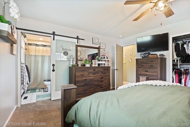 605 Shawnesee, Flushing, MI 48433 - carpeted bedroom with a ceiling fan, a barn door, ensuite bathroom, and a closet