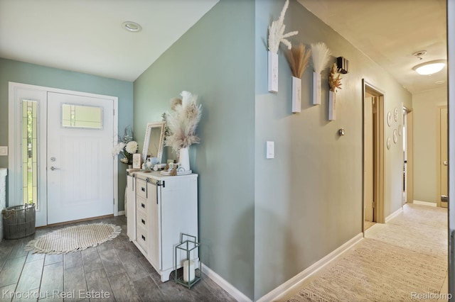 605 Shawnesee, Flushing, MI 48433 - foyer featuring wood finished floors and baseboards