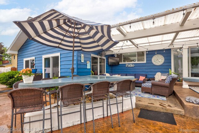 605 Shawnesee, Flushing, MI 48433 - view of patio / terrace featuring outdoor lounge area, a pergola, and outdoor dining area