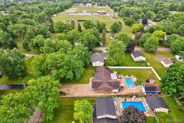 605 Shawnesee, Flushing, MI 48433 - aerial view of property and surrounding area featuring a pool area and property boundaries highlighted