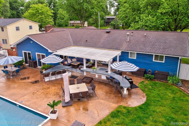 605 Shawnesee, Flushing, MI 48433 - rear view of house featuring outdoor dining area, a patio area, and roof with shingles