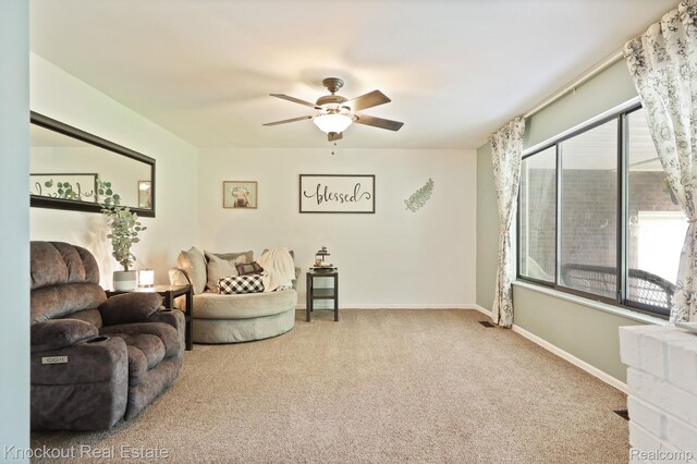 605 Shawnesee, Flushing, MI 48433 - carpeted living room with a ceiling fan and baseboards