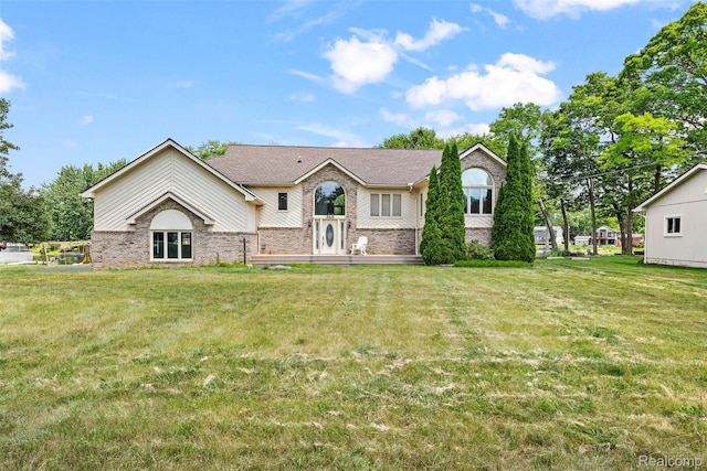 969 Bogie Lake Rd, White Lake, MI 48383 - split foyer home with brick siding and a front yard