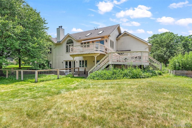 969 Bogie Lake Rd, White Lake, MI 48383 - back of property featuring stairs, a wooden deck, and a chimney