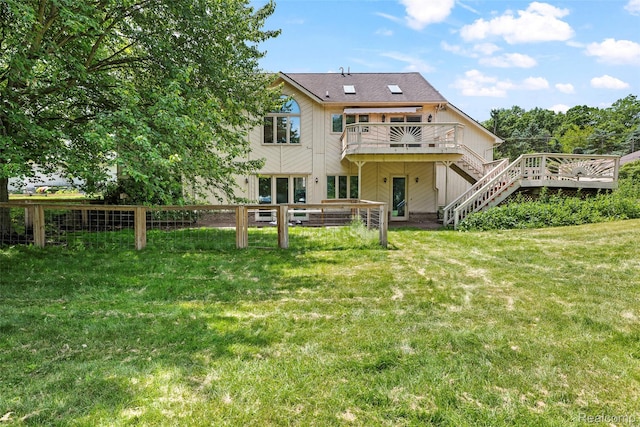 969 Bogie Lake Rd, White Lake, MI 48383 - rear view of property featuring a wooden deck and stairs