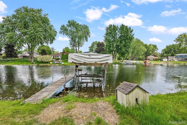 969 Bogie Lake Rd, White Lake, MI 48383 - dock area featuring boat lift and a water view