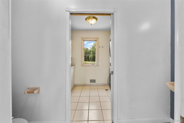 969 Bogie Lake Rd, White Lake, MI 48383 - interior space featuring toilet and tile patterned floors