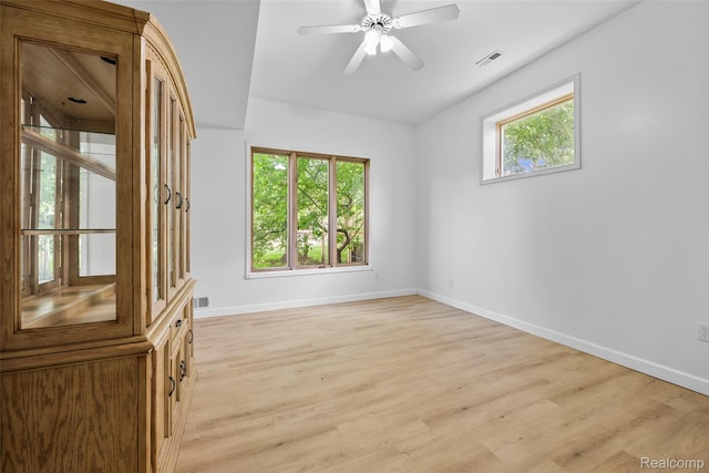 969 Bogie Lake Rd, White Lake, MI 48383 - empty room with light wood-style flooring and a ceiling fan