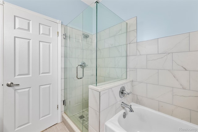 969 Bogie Lake Rd, White Lake, MI 48383 - bathroom with a stall shower and a bath