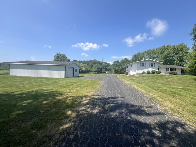7567 S Bignham Ave, Newaygo, MI 49337 - view of asphalt driveway