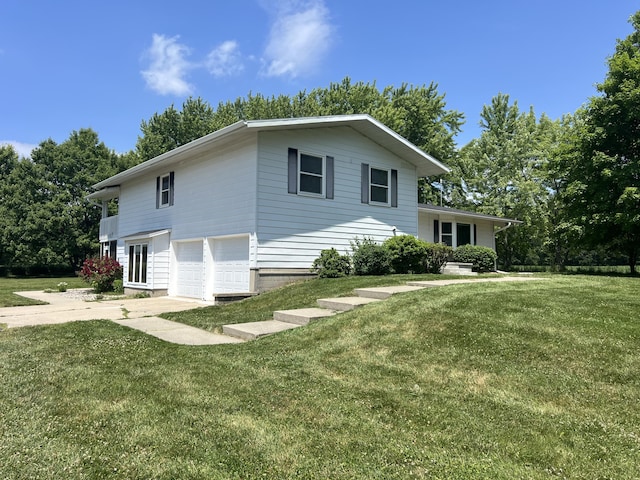 7567 S Bignham Ave, Newaygo, MI 49337 - view of side of home with a garage and a yard