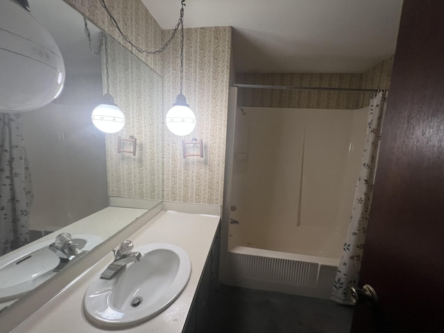 7567 S Bignham Ave, Newaygo, MI 49337 - bathroom with wallpapered walls, shower / tub combo, and vanity
