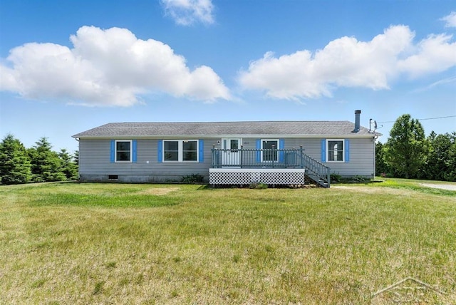 3227 S 11 Mile Rd, Auburn, MI 48611 - manufactured / mobile home with a wooden deck and a front yard
