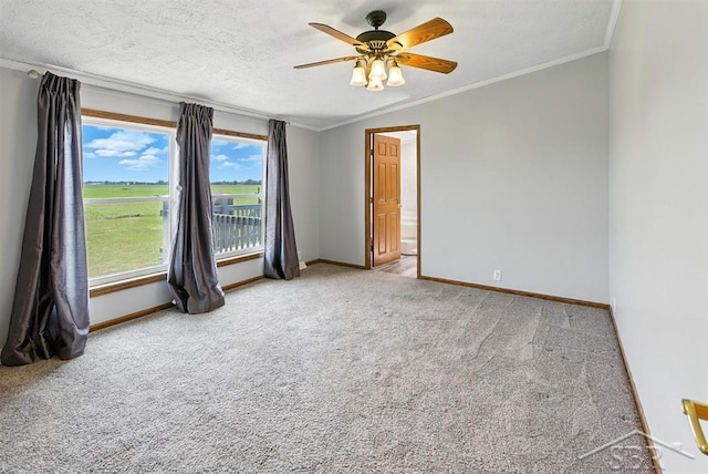 3227 S 11 Mile Rd, Auburn, MI 48611 - spare room featuring light carpet, crown molding, a ceiling fan, and a textured ceiling