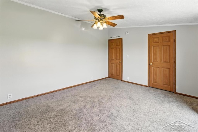 3227 S 11 Mile Rd, Auburn, MI 48611 - carpeted spare room featuring a ceiling fan and crown molding