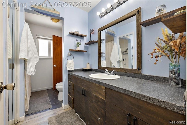 6129 N Linville St, Westland, MI 48185 - bathroom featuring vanity and wood finished floors