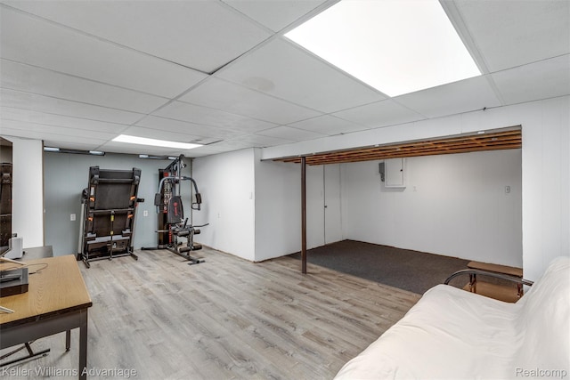 9286 Dudley St, Taylor, MI 48180 - finished basement featuring wood finished floors, a drop ceiling, and electric panel