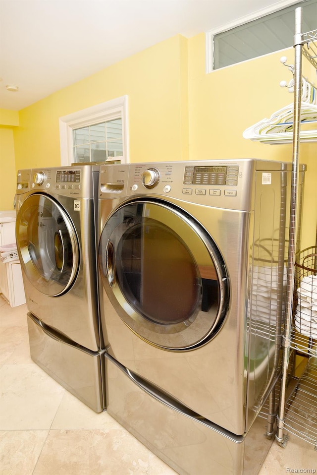 5100 Kings Gate Way, Bloomfield Hills, MI 48302 - washroom featuring washing machine and dryer and tile patterned flooring