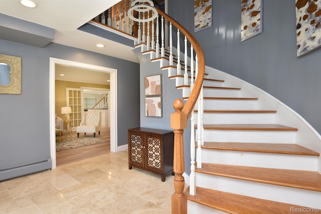 5100 Kings Gate Way, Bloomfield Hills, MI 48302 - stairway featuring a baseboard heating unit and recessed lighting