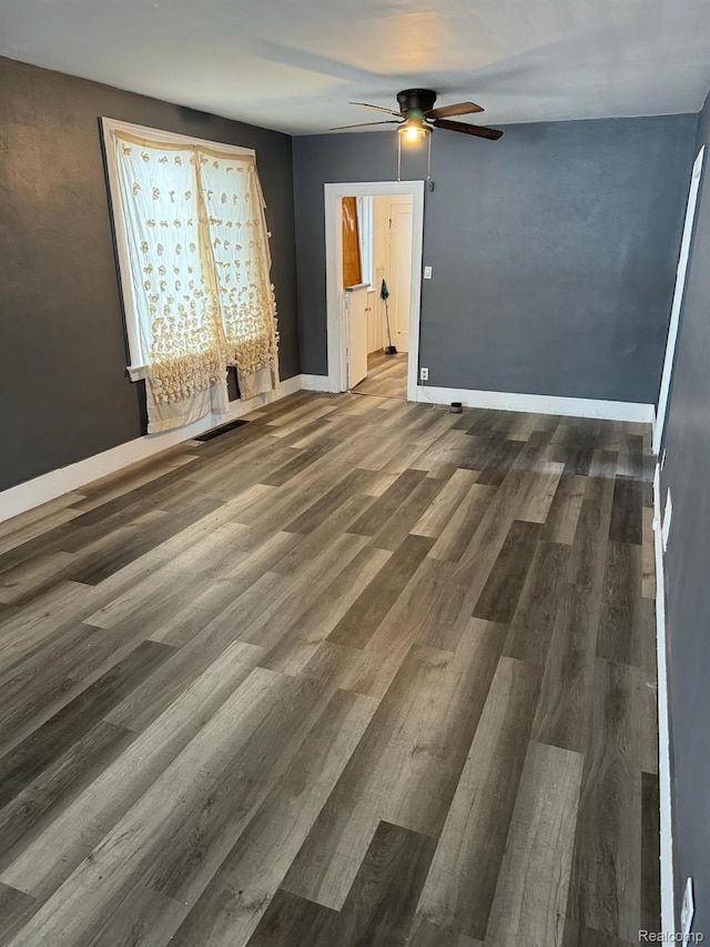 19656 Mitchell St, Detroit, MI 48234 - unfurnished bedroom with wood finished floors and a ceiling fan