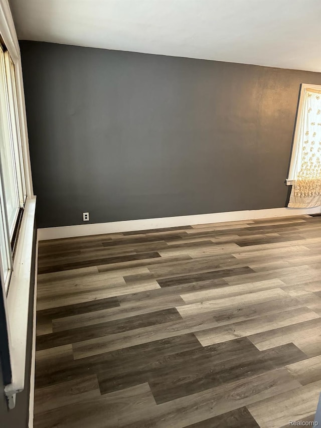 19656 Mitchell St, Detroit, MI 48234 - unfurnished room featuring wood finished floors
