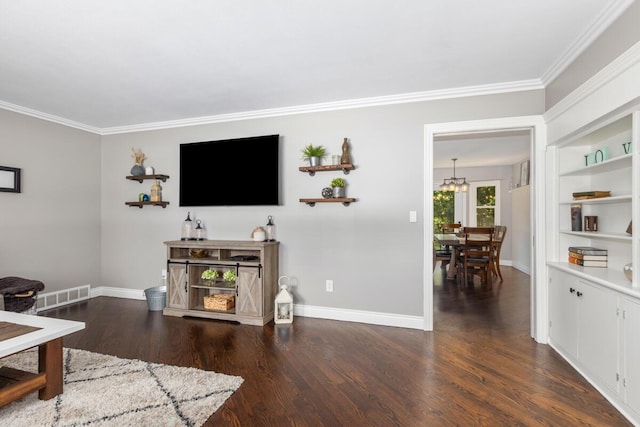 4662 60th St SW, Wyoming, MI 49418 - living room with ornamental molding, wood finished floors, and a chandelier